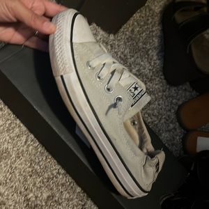 Converse slip on! Very comfortable, and so cute with pretty much anything!